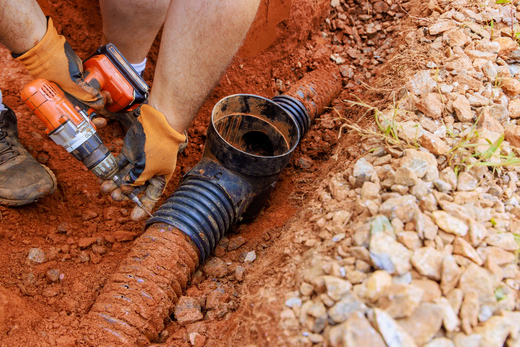 Drainage system damaged by rainwater is being replaced with underground storm a sewers.